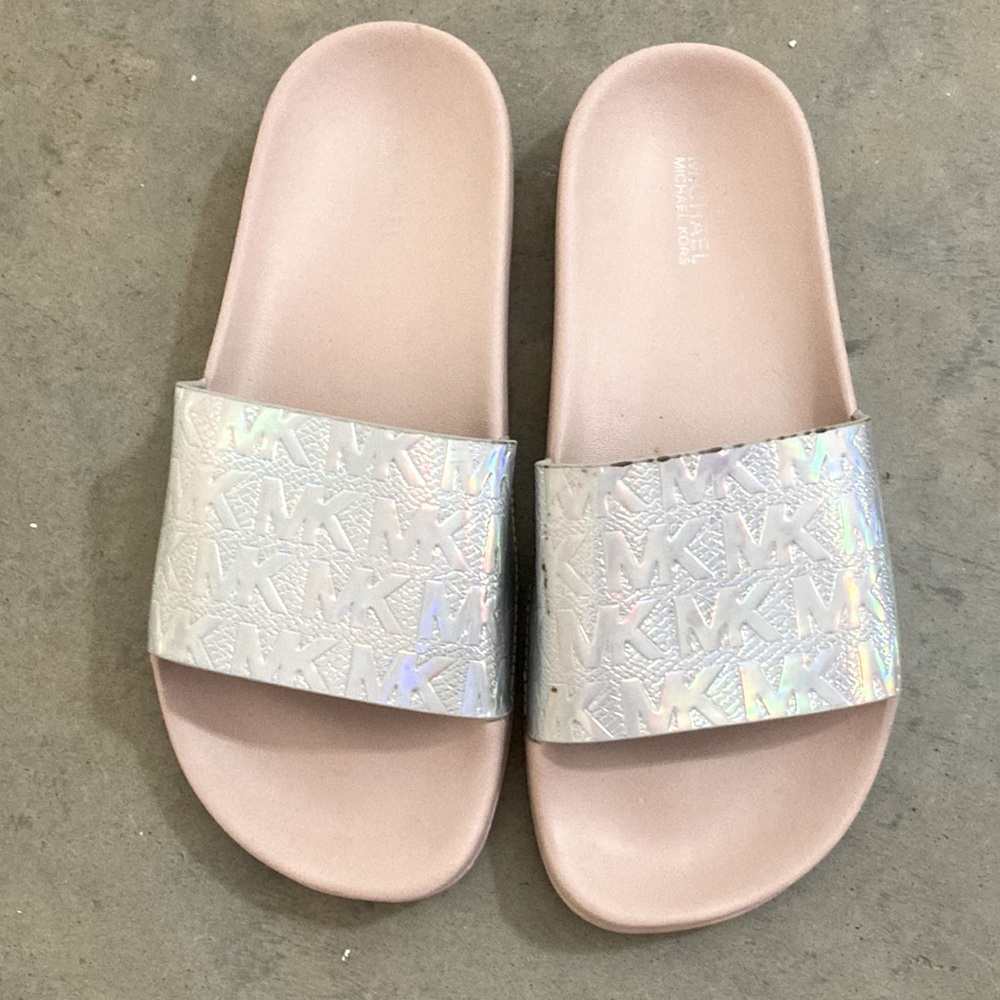 Michael Kors holographic Eva foam sole slip on shoes.